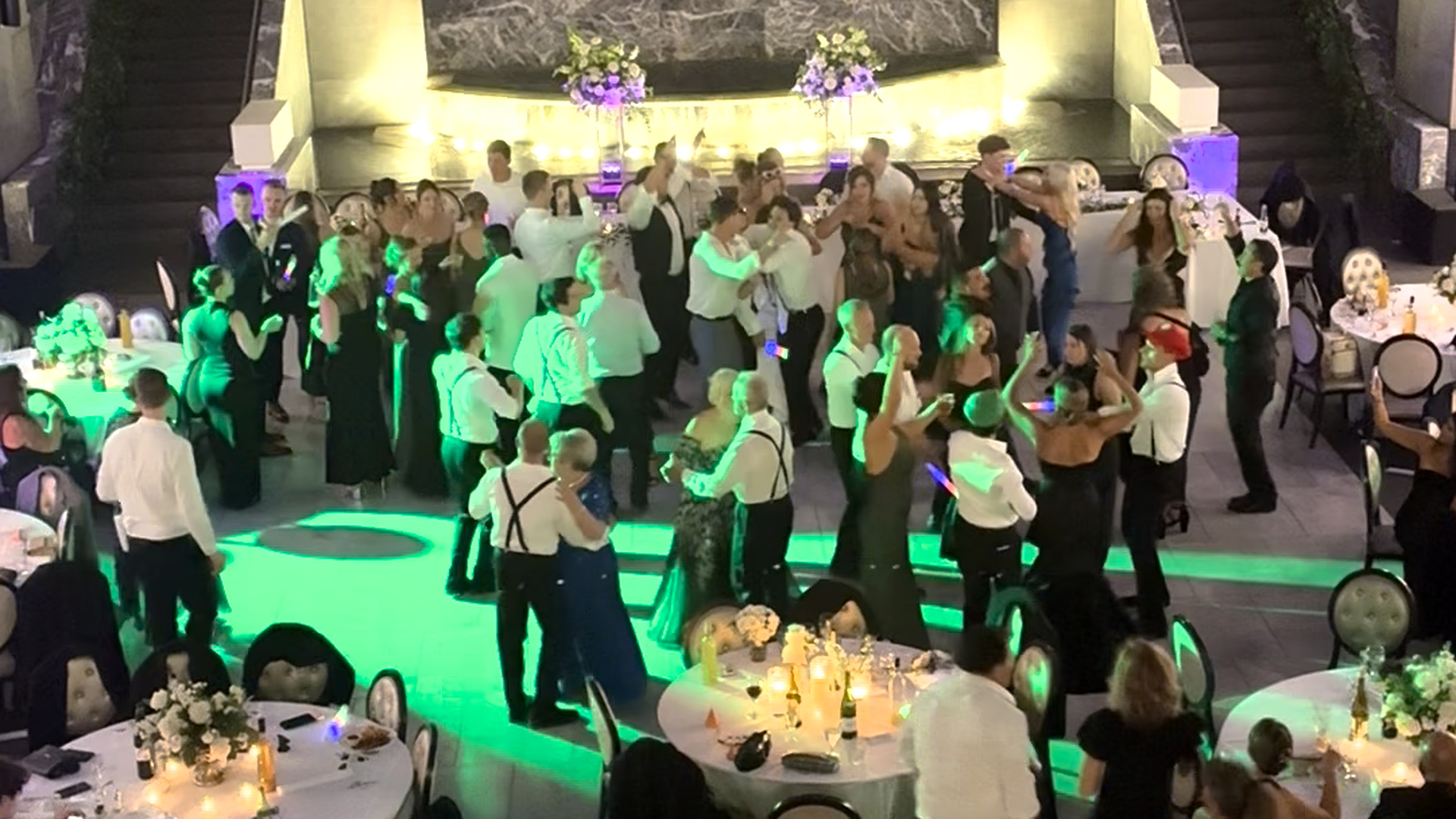 Pazzo's Chicago Wedding DJ & Dance Floor Lighting Pazzo's Chicago wedding DJ with packed dance floor and lighting at 311 S Wacker Drive